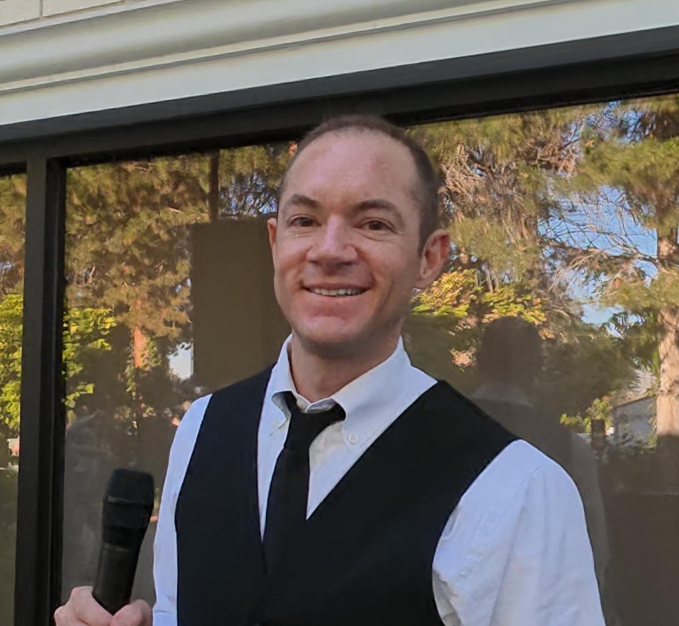 Dallin, mobile DJ, smiling at the camera